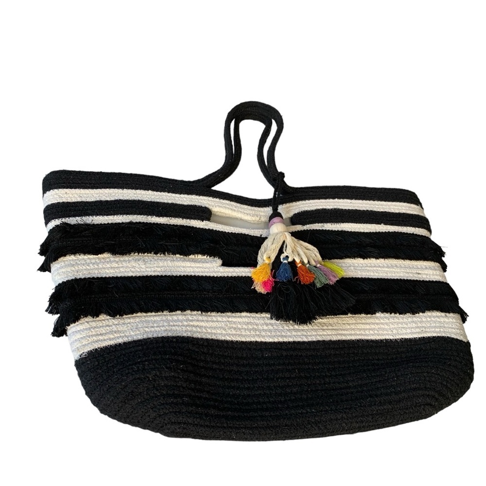 Stella & Dot black and white boho striped beach shoulder bag with tassel.